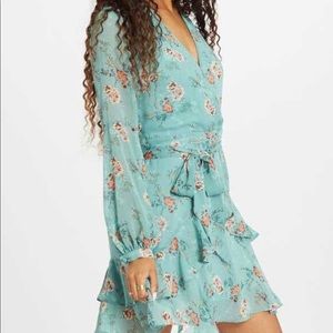 Teal ruffle and floral cocktail dress